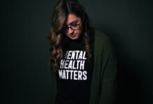 woman in black and white long sleeve shirt